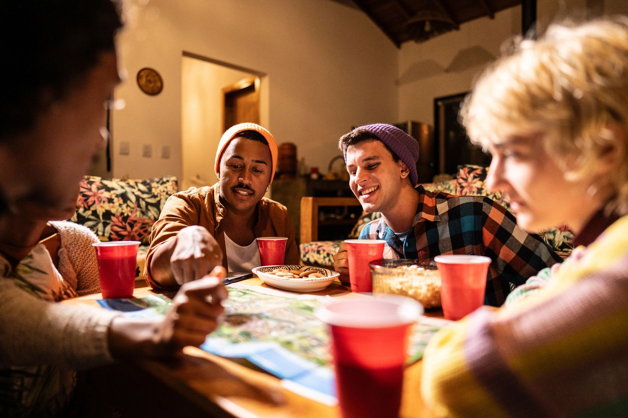 Friends enjoying a relaxed mahjong-style game night together